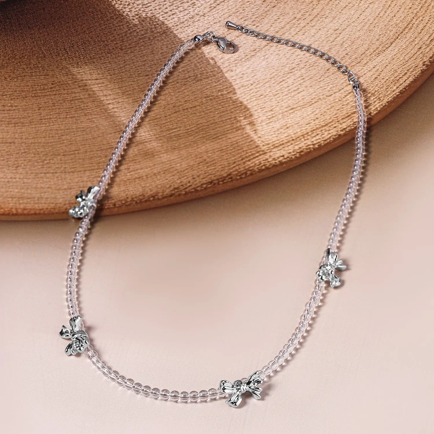 Delicate Dual-Strand Crystal Bead Necklace with Silver-Plated Bow Charms