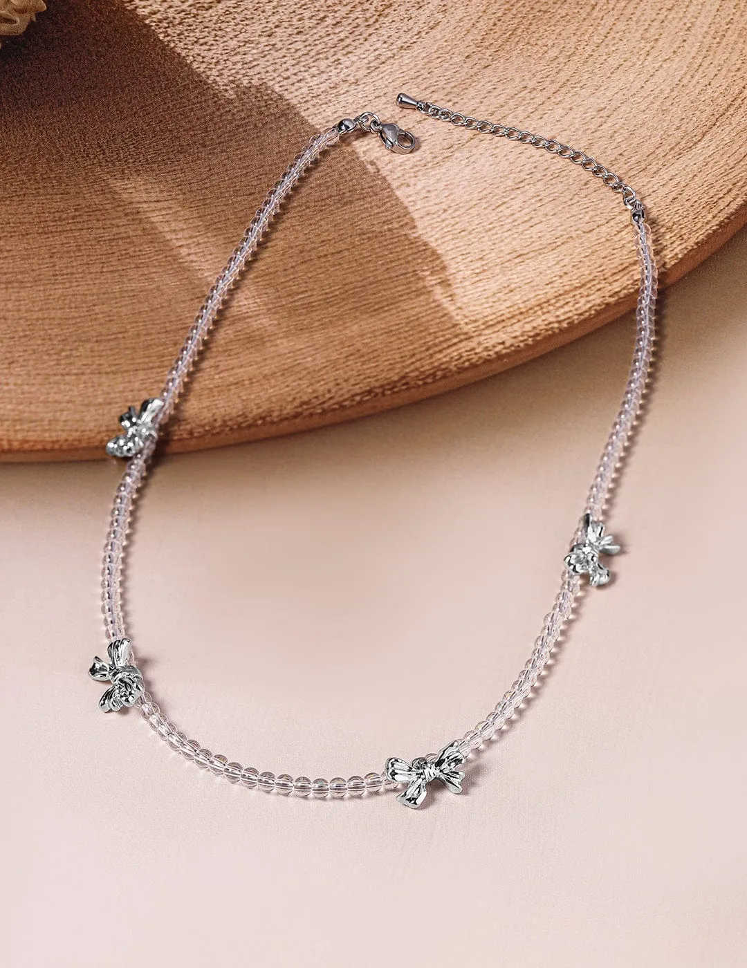 Delicate Dual-Strand Crystal Bead Necklace with Silver-Plated Bow Charms