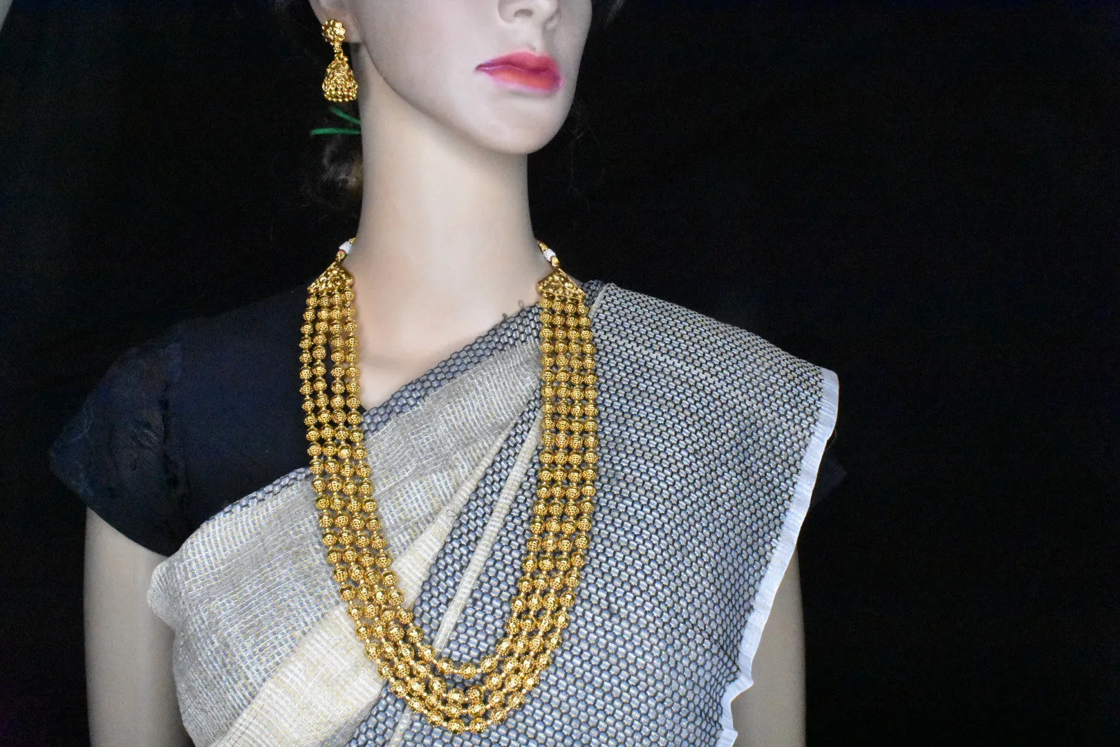 Four layered Golden Beads Mala